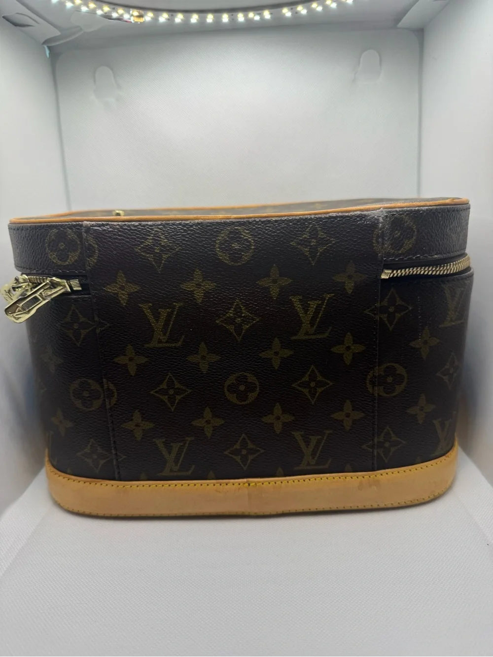 Louis Vuitton travel tan
